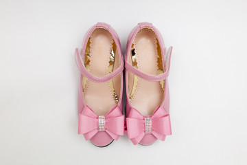 pink shoes for girl on white background