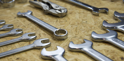 tools in tool belt on wood planks