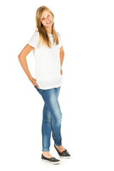 Fototapeta premium Young girl standing smiling over white background
