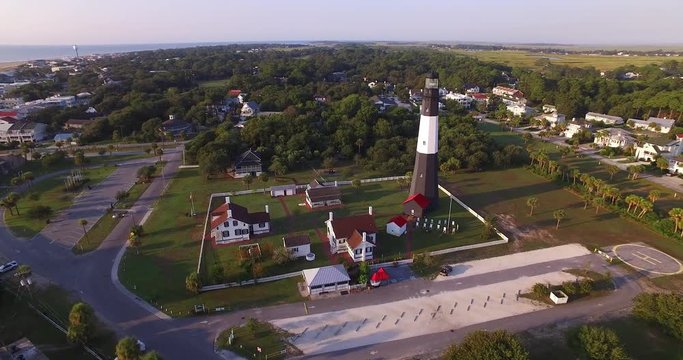 Aerial perspective of the Tybee Island Light Station Lighthouse, moving around to see Tybee Island.