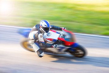 Fototapeta na wymiar Dynamic motorbike racing