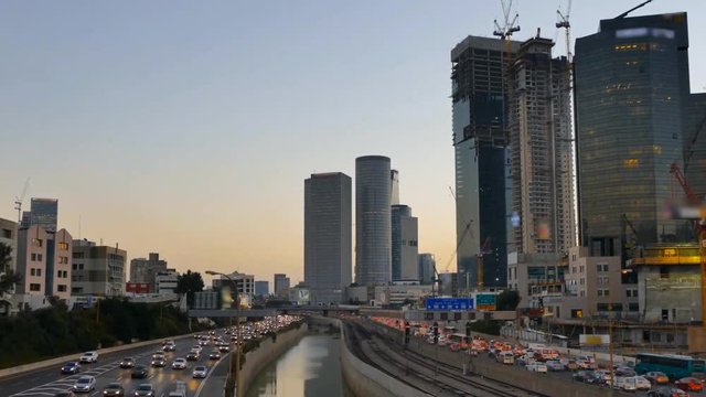 Time lapse - Central Tel Aviv skyline day to night with traffic