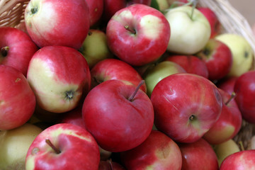 juicy, ripe apples in a wattled basket