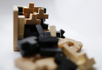 Wooden puzzle blocks on white background