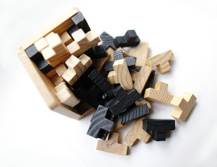 Wooden puzzle blocks on white background