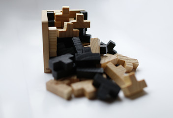 Wooden puzzle blocks on white background