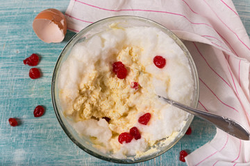 Dough for cottage cheese casserole, shell and towel, top view