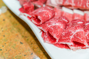Uncooked raw fresh beef .