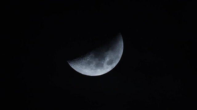 Clouds Passing Over the Moon