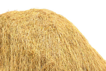 stack of straw in the field