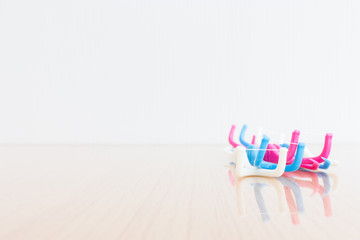 Dental floss on wooden background