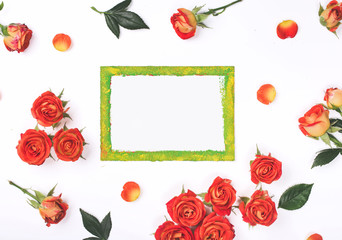 Blank card with red roses on white background