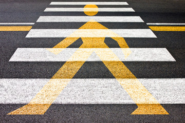 Black and white pedestrian crossing with silhouette of man on it