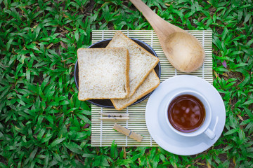 Breakfast is served
There is coffee and bread and cookie