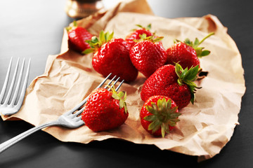 Tasty strawberry on paper
