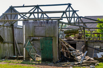 Neglected and collapsed shed from close