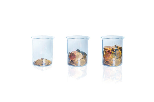 Coin in three bottle on white background