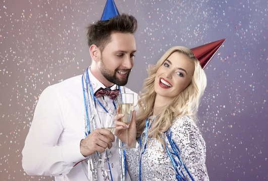 Happy couple celebrating the New Year's Eve