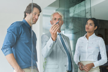 Fototapeta premium Business team analyzing graph