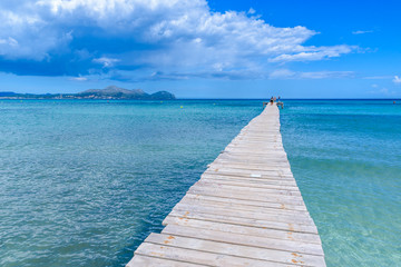 Pier at Playa Muro - beautiful beach on Mallorca, balearic island of spain