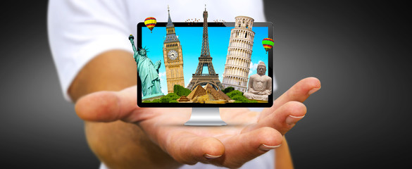 Man travelling the world with his computer