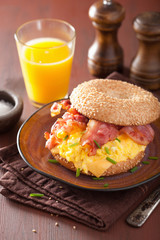breakfast sandwich on bagel with egg bacon cheese