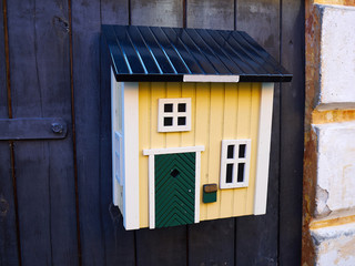 Creative mailbox shaped like a house