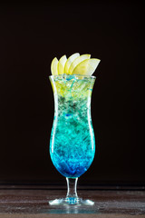 classic cocktail on a dark bar