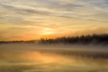 Naklejka na ściany i meble lake sunrise fog golden