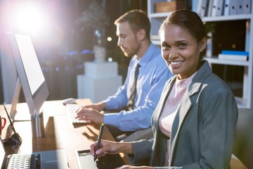Businesspeople working in office