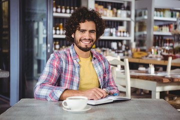 Fototapeta premium Portrait of man with a diary