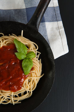 Patsa with tomato sauce on the pan