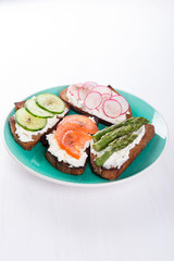 Four different sandwiches on the plate