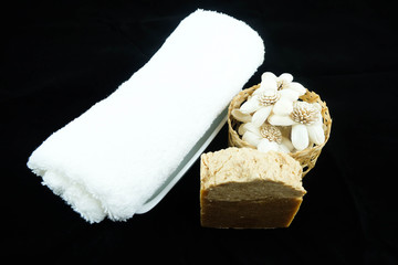 Handmade soap. Black background.