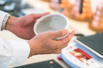 Japanese tea ceremony -Serving a cup of tea horizontal
