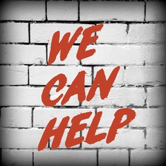 The words We Can Help in red text on a black and white brick wall background as a reminder that support is out there