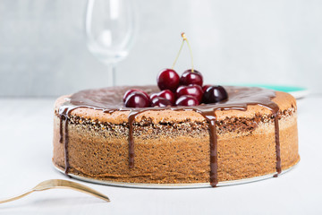 Chocolate cake with juicy cherries