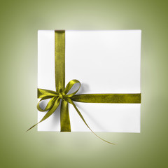 Isolated Holiday Present White Box with green Ribbon on a gradient background