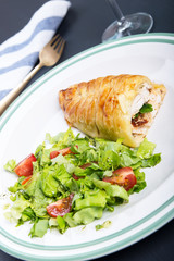 Chicken breast in french pastry with fresh salad