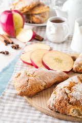 Obraz na płótnie Canvas Apple scones for breakfast with apple cider glaze. Selective focus.