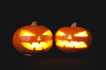 Halloween pumpkins smile and scary eyes for party night