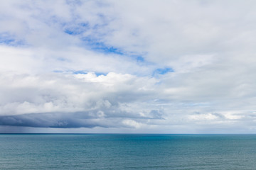 Naklejka na ściany i meble Powerful clouds over ocean in Australia