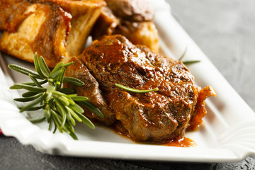 Osso bucco beef with vegetables and rosemary