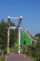 Little white bridge and small wooden house in Zaanse Schans