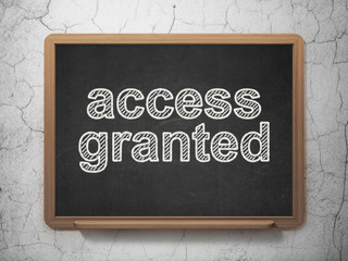 Safety concept: Access Granted on chalkboard background