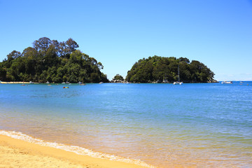 Fototapeta na wymiar Beautiful orange beaches along the Abel Tasman Great Walk.