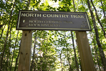 On The North Country Trail. Mileage marker for the North Country Trail in the Upper Peninsula of...