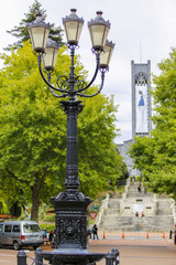 Fototapeta na wymiar Street lantern, view of Christ Church Cathedral in Nelson