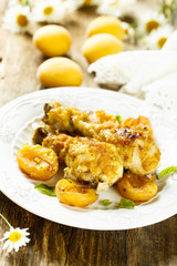 Chicken legs baked with apricots