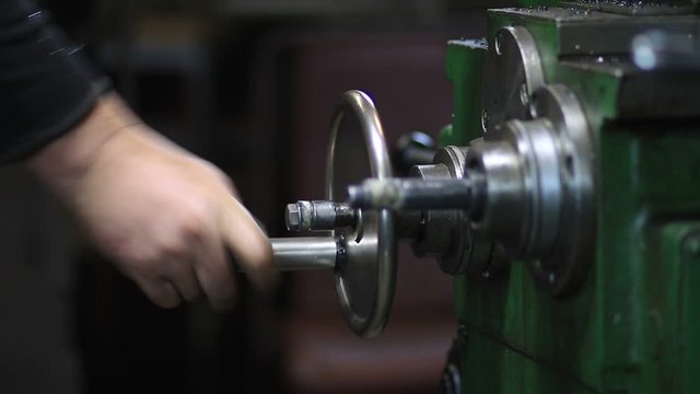 Hand steering adjustable wheel on lathe machine